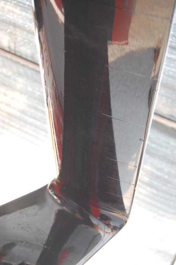 Here is another example of what you want to see. The oil dots on the bottom of the rear wing streaked straight back, all the way to the trailing edge. This means that the airflow was fully attached, and the wing was working efficiently. If the oil streaks on your wing suddenly turn 90 degrees, that indicates flow separation at the turn point.