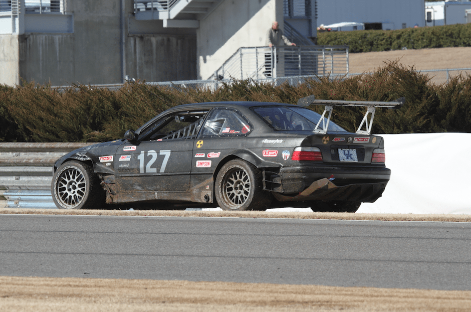 Turn 4 apexes at the crest of a blind hill, and it sent one BMW spinning off track.