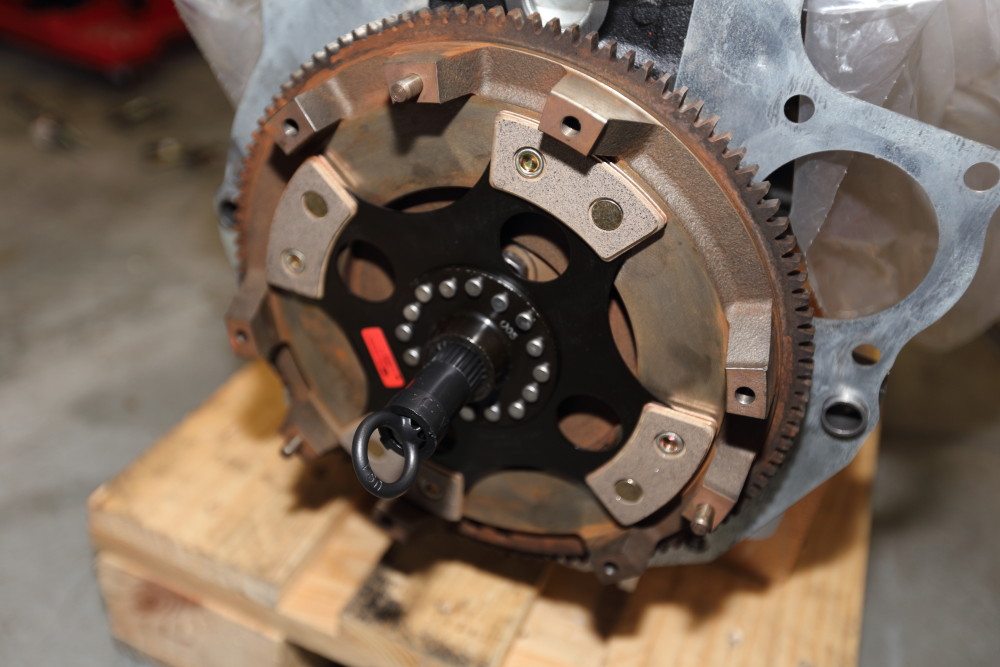 The alignment tool slips into the pilot bearing and holds the clutch disc in place. The appearance of your disc will vary. This is an unsprung, four-pad racing clutch not really suitable for street use. Most clutch discs are actually discs that have a springs in the hub to cushion engagement.