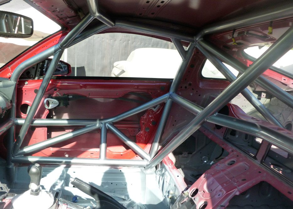 Chassis flex makes the whole car an undamped spring which is very difficult to tune. Well-conceived bar placement should improve the structural integrity of the roll cage and improve safety. A byproduct of this is an increase structural rigidity of the platform, which will reduce chassis flex also. 