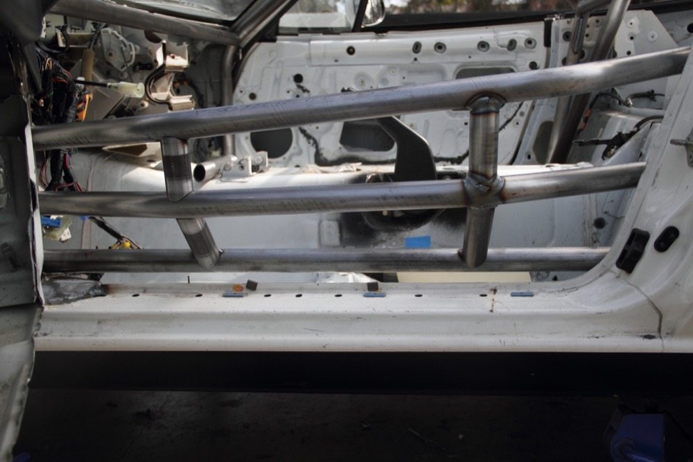 Construction Zone – Installing Custom Roll Cage and an Aluminum Containment Seat in a Spec Miata