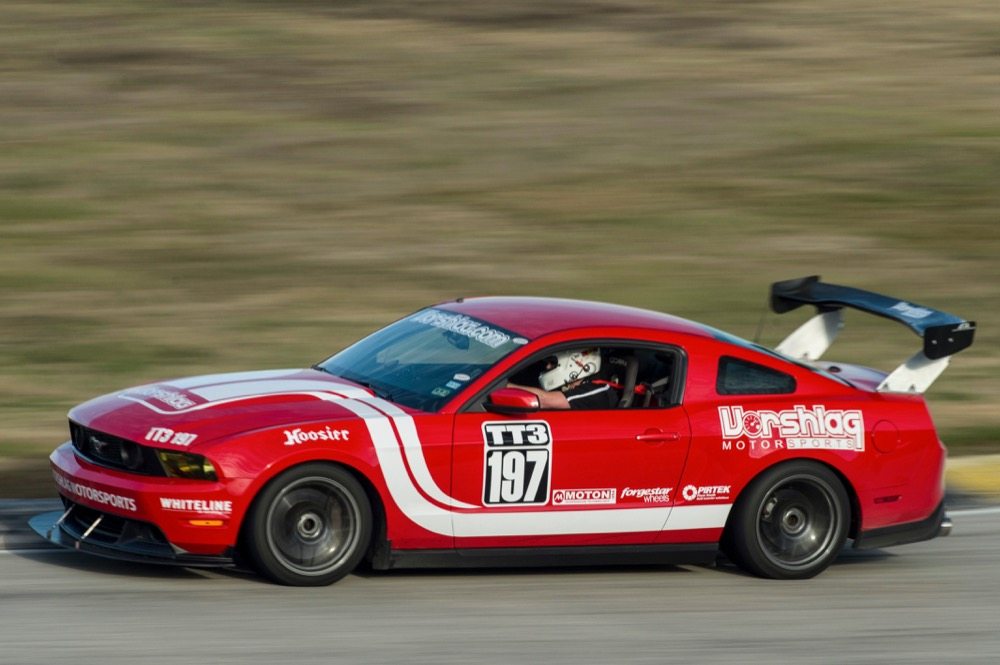 For track events, adding a front splitter and a rear wing made the Fairs’ Mustang faster and easier to drive. This combination of aero devices produced a good front-to-rear downforce balance. The rear window angle is shallow enough to keep the airflow over the car attached, so the wing operates in a clean air flow field.