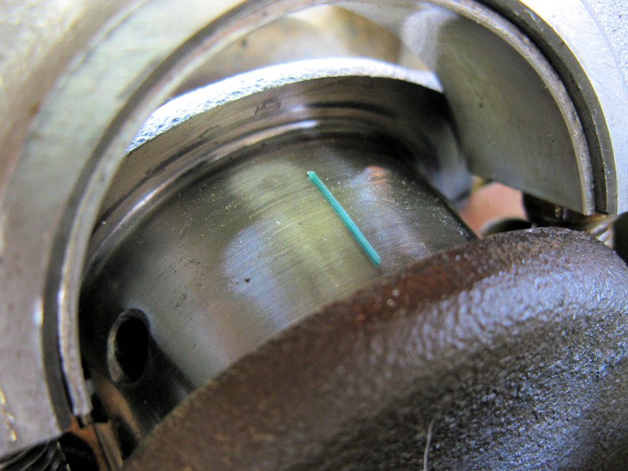 To check the clearances between the main and rod bearings lay a strip of Plastigauge across the dry journal, then torque the main and rod caps to factory spec. 