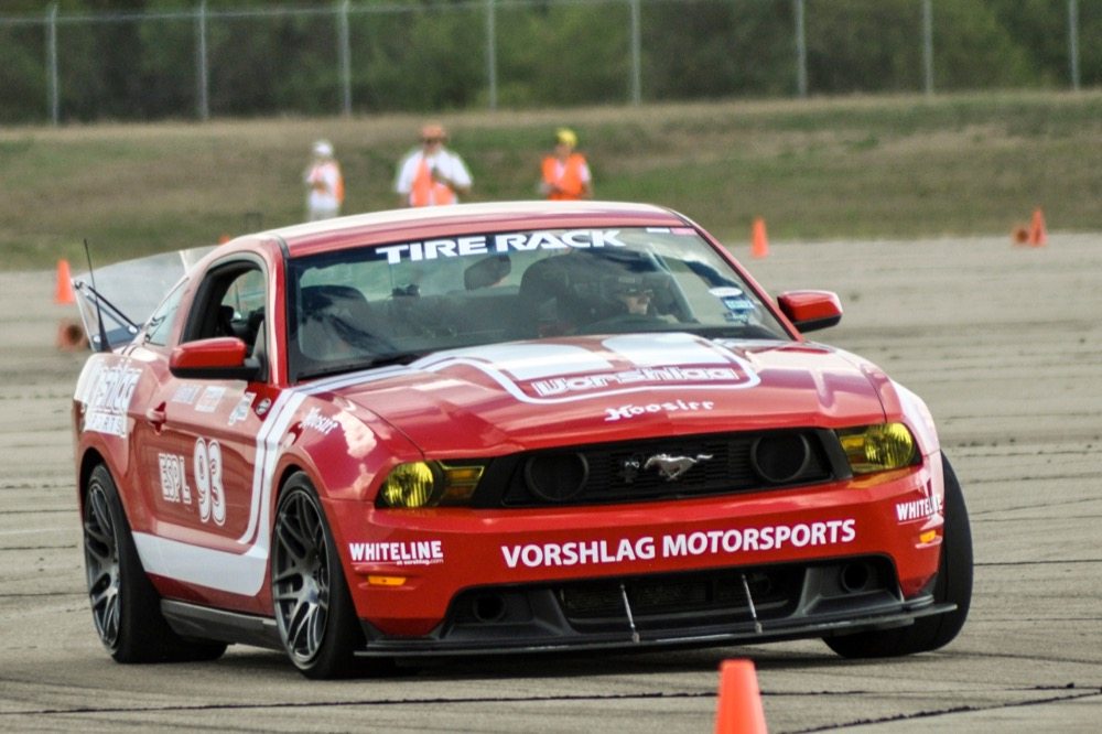 The clear rear spoiler on Amy and Terry Fair's Mustang is effective at all speeds, and it provides full rear visibility. A spoiler this tall is only optimum for autocross because the drag it creates at higher speeds would produce slower lap times on a road course.