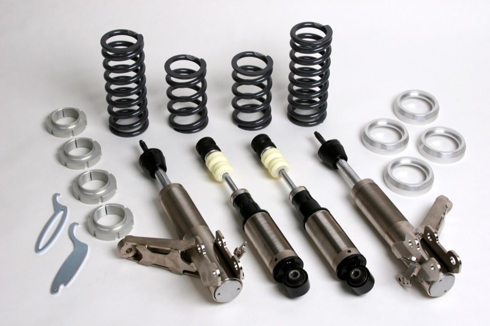 Properly designed strut suspension systems using coilover springs and adjustable ride heights like these from Progress Technology make setup on a strut car much easier.