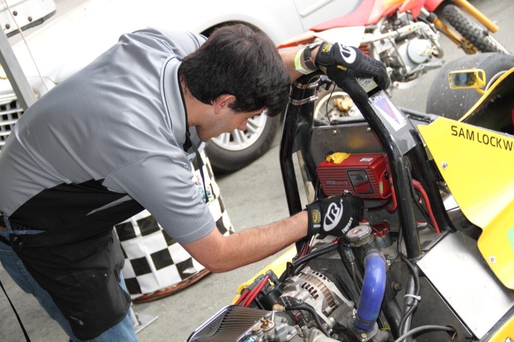 A friend who is mechanically inclined and is willing to come to the track with you allows you to focus on racing.