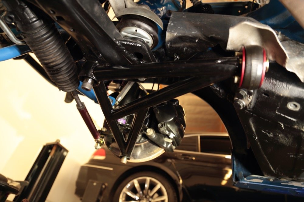 Up front, ITDG installed Bimmerworld lower control arms and bushings and reinforced the subframe where it attaches to the unibody, which also is where the engine attaches. ITDG also welded braces on the underside of the strut towers.
