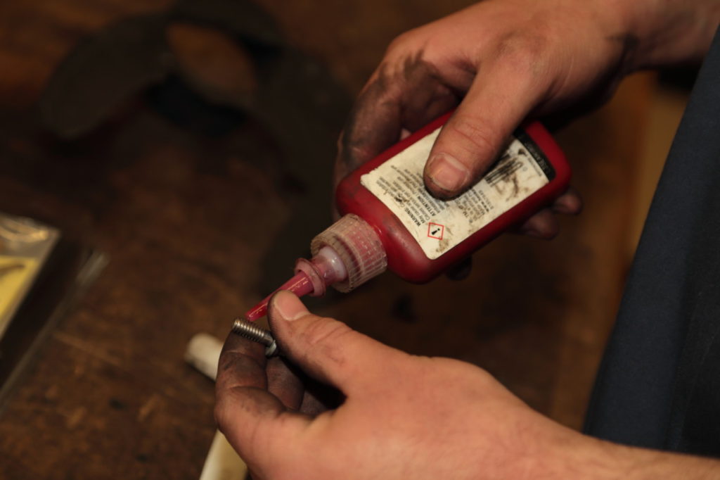 Bushman applied to each bolt a dollop of No. 516 Loctite, a thread sealant that provides excellent solvent resistance and an operating temperature range from 65 degrees to 300 degrees Fahrenheit.
