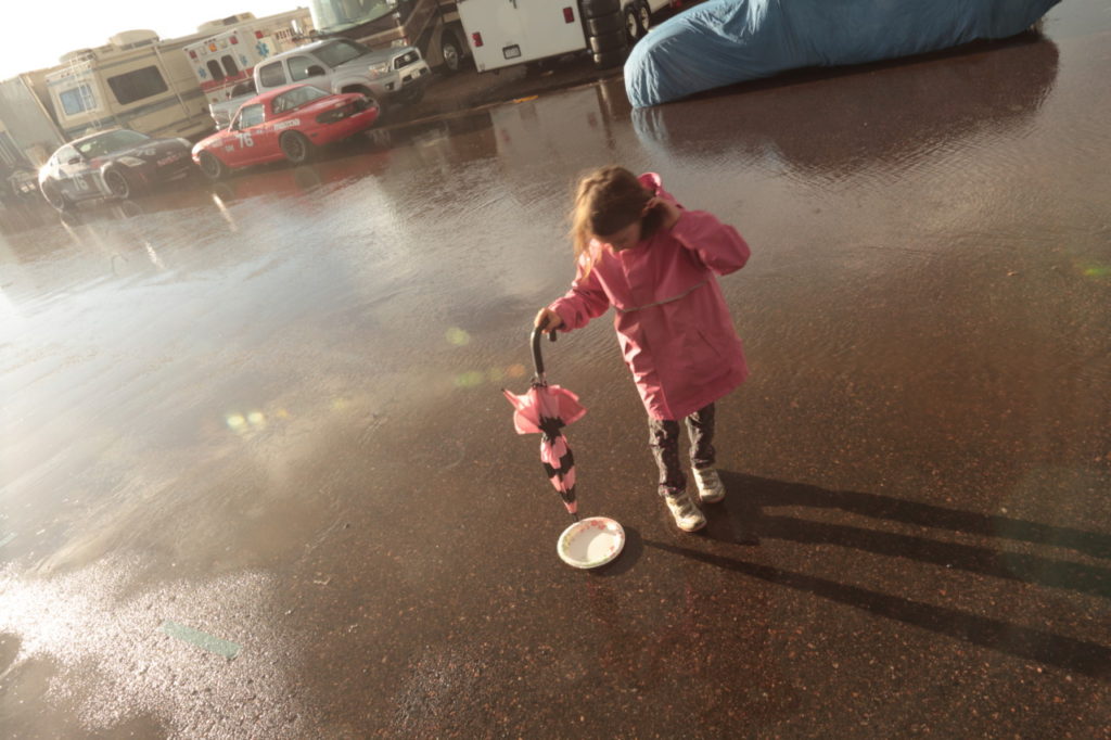 After the day’s racing had concluded on Saturday, a quick and heavy rain blew in from the Rocky Mountains and forced everyone at the Saturday night barbecue under the pavilion at High Plains Raceway. After the rains had passed, the puddles proved irresistible.